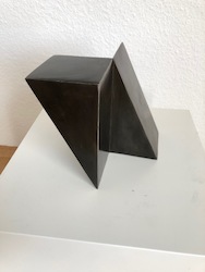 TWO QUATER OF A CUBE DIAGONALLY CUT IN HALF