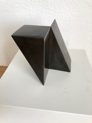 TWO QUATER OF A CUBE DIAGONALLY CUT IN HALF